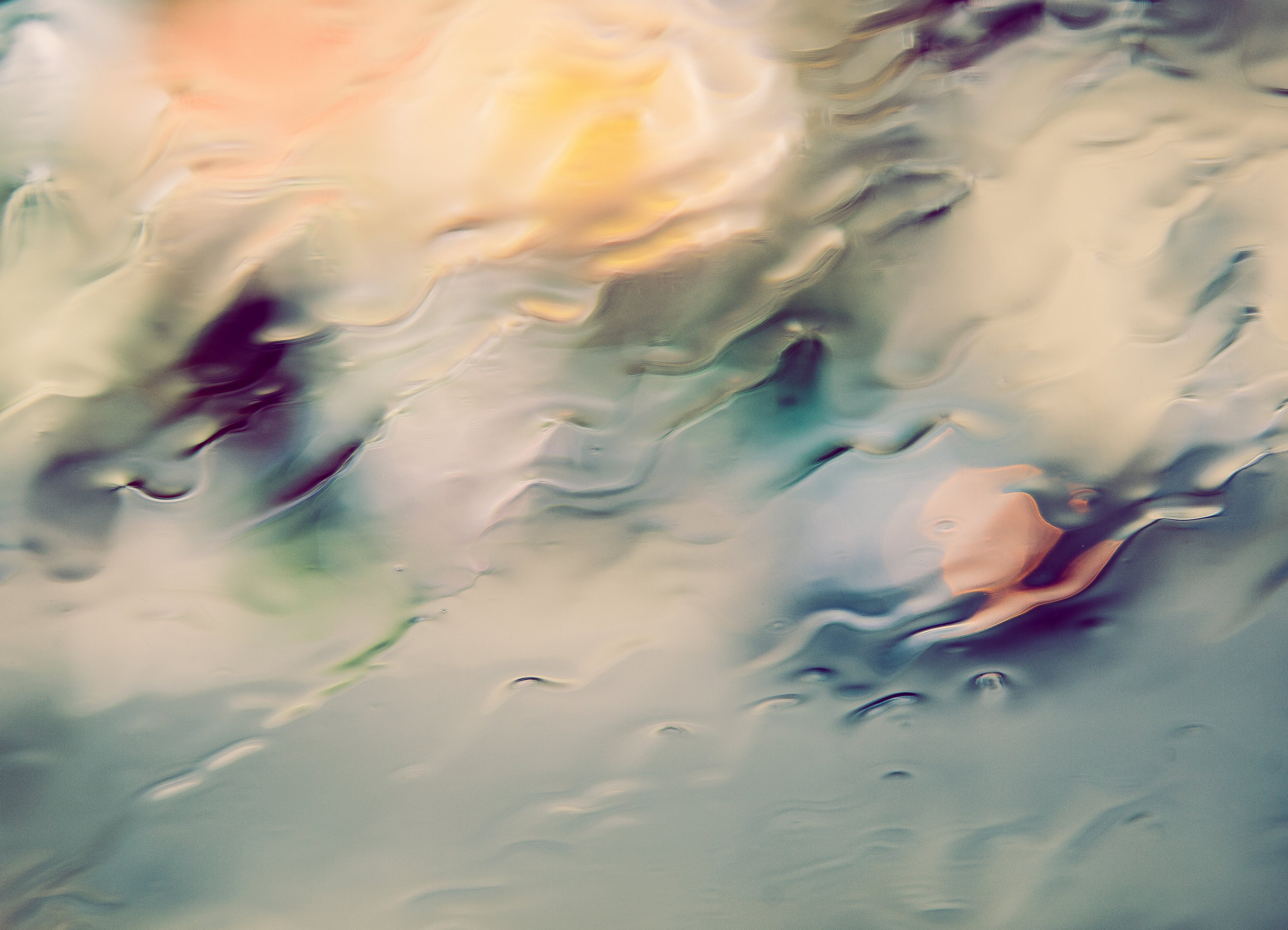 Rain coming down window