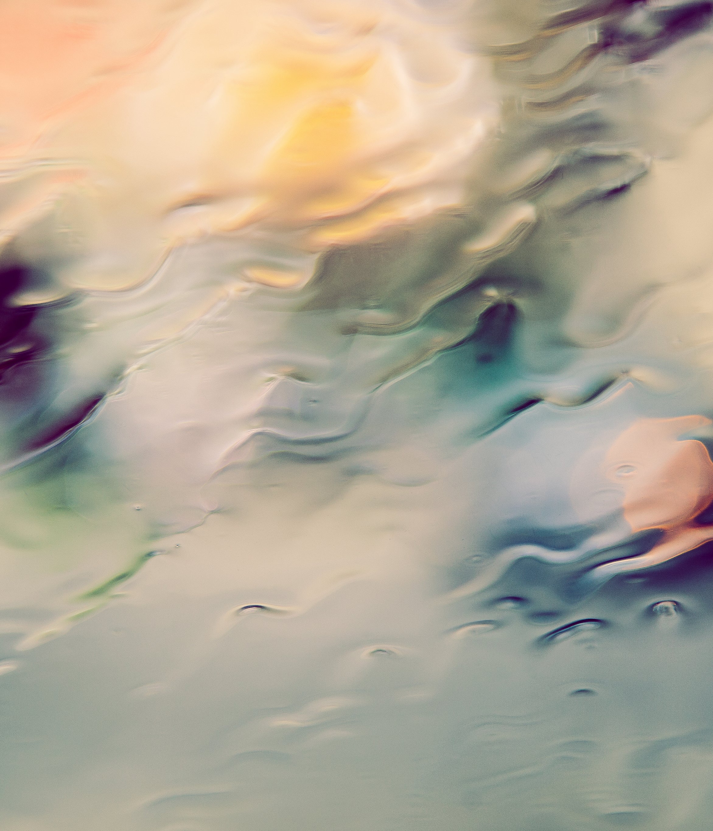 Rain coming down window